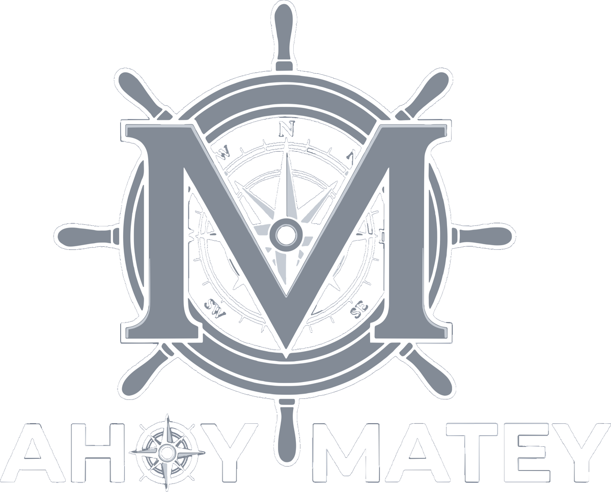 Ahoy Matey logo: a ship's wheel with a compass rose and a large M
